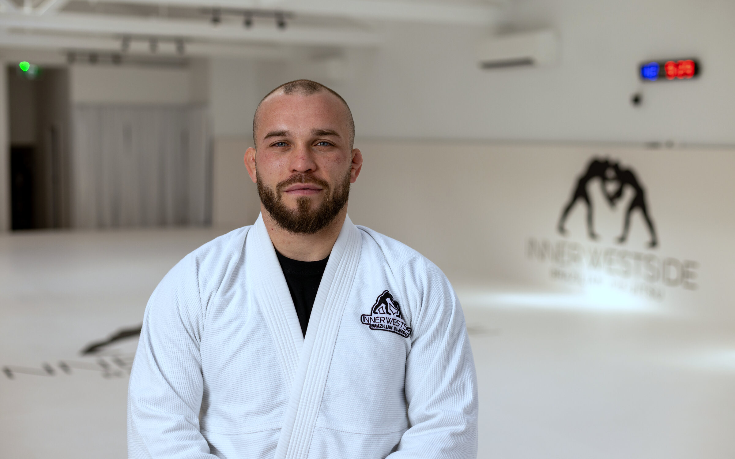 Head coach Hayden Limebeer, 1st-degree black belt, on the mats at Inner Westside BJJ Leichhardt