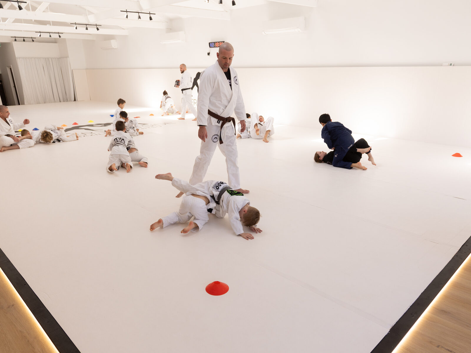 Kids class training on the mats at Inner Westside BJJ Leichhardt